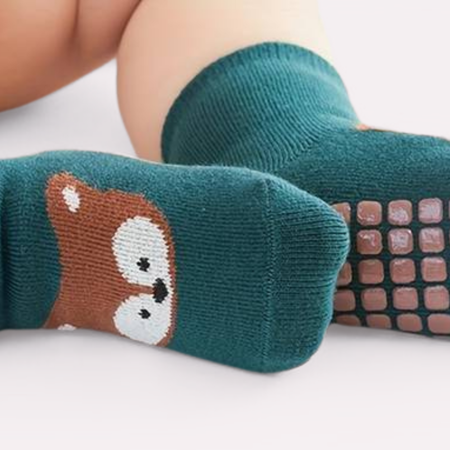 ANIMAL GRIPPER SOCKS . Up to 12 Months