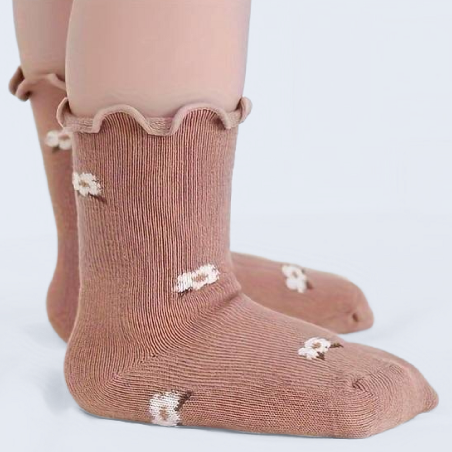 RUFFLE GRIPPER SOCKS . Up to 12 Months