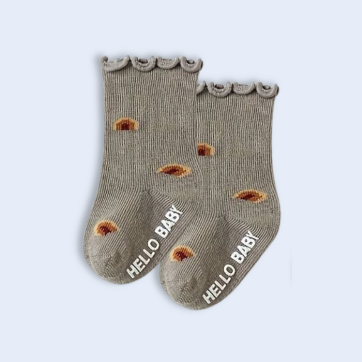 RUFFLE GRIPPER SOCKS . Up to 12 Months